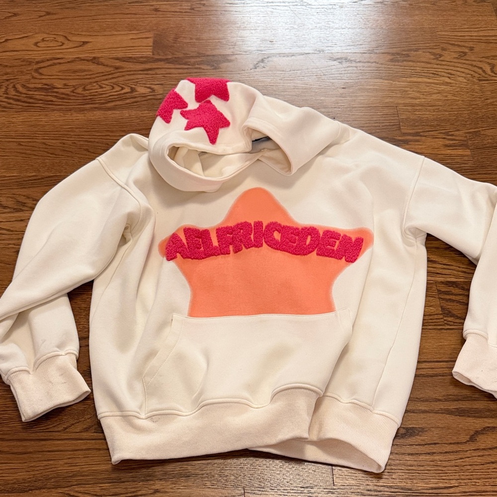 Aelfric Eden Cream Hoodie with Pink and Orange Star Accents